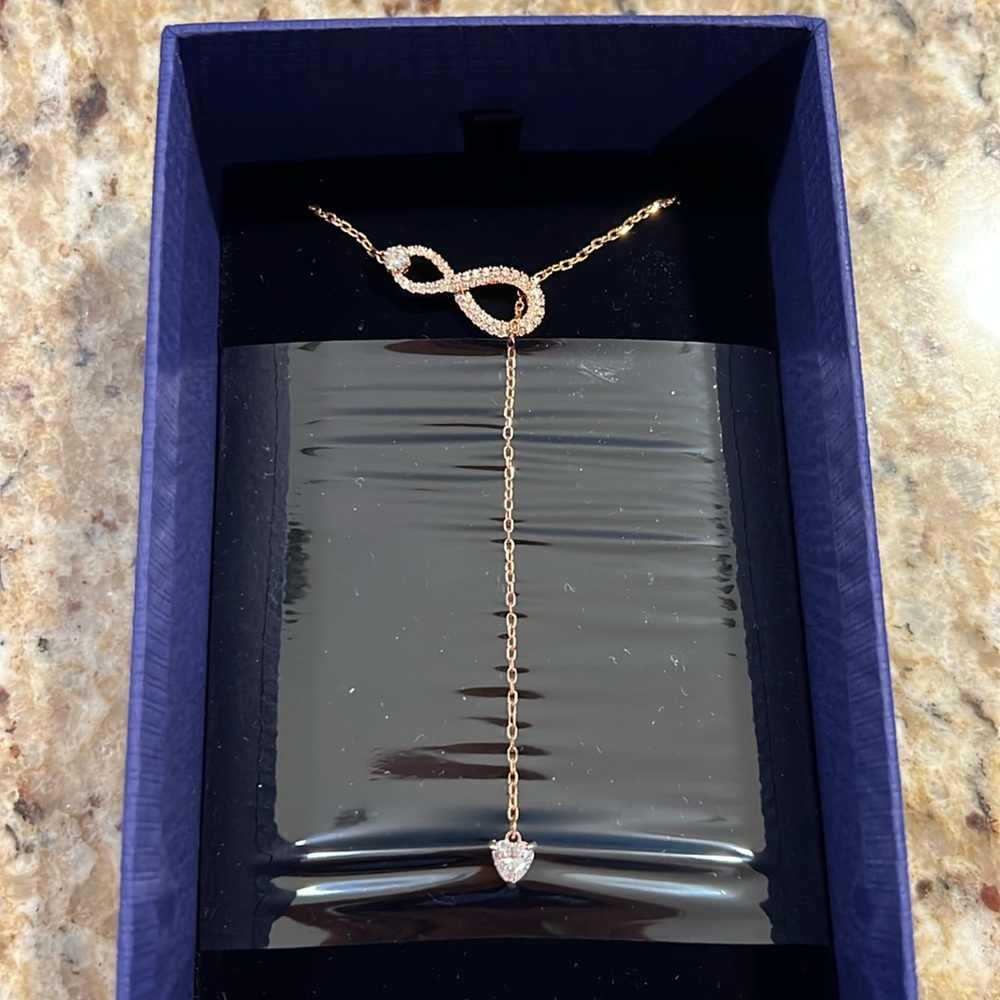 SWAROVSKI Infinity Twist Necklace with Rhodium & Rose Gold Tone Finish